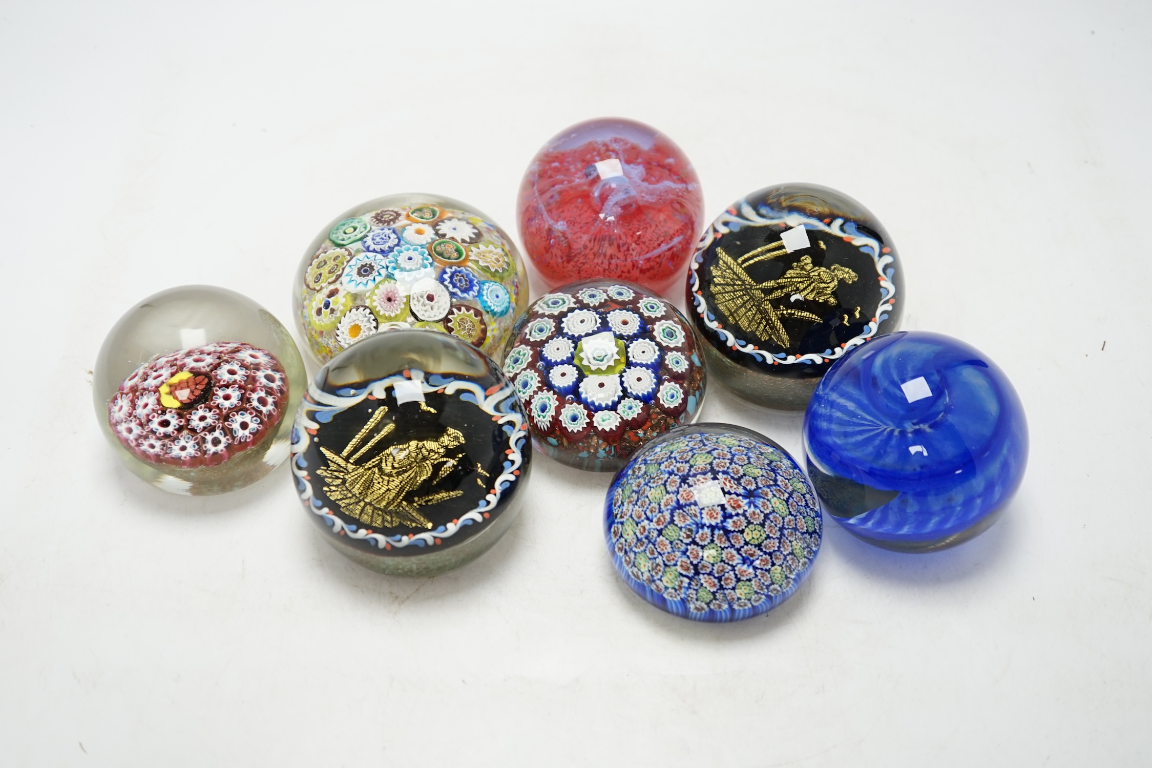 A group of eight various glass paperweights including millefiori, tallest 8cm. Condition - varies, poor to fair